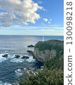 A spectacular view of Cape Ashizuri Lighthouse, cliffs, and the Pacific Ocean 130098218