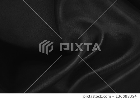 Black fabric cloth texture for background and design art work, beautiful crumpled pattern of silk or linen. 130098354