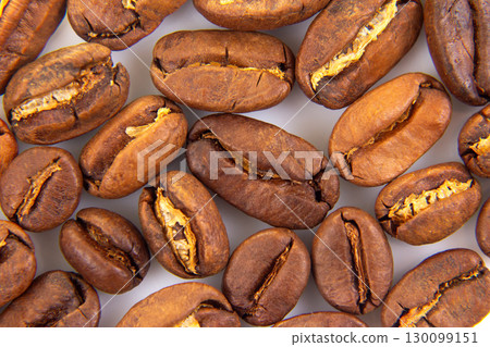 Vibrant macro image of roasted coffee beans, 130099151