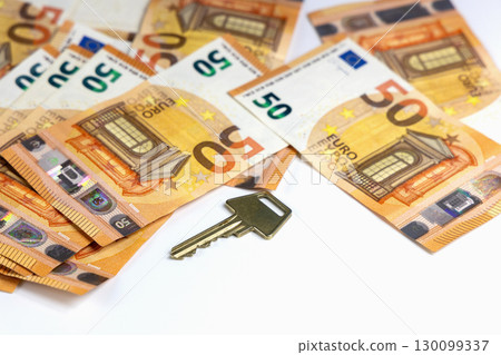 50 euro banknotes with key on white 50 euro banknotes with key on white 130099337