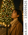 Profile of a woman looking up at the illuminations 130099426
