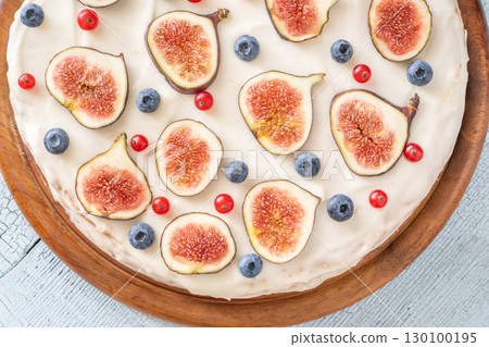 Whole cream cheese berry layer cake topped figs currant blueberries Whole cream cheese berry layer cake topped figs currant blueberries 130100195