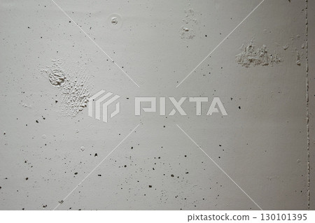 Rough white wall with small holes and small bumps 130101395