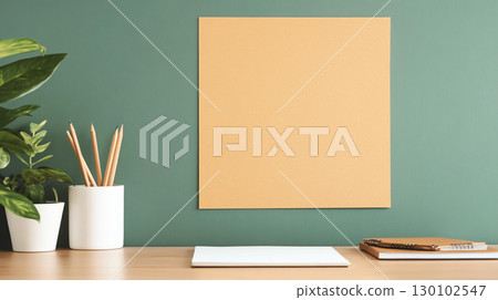 Workspace with blank yellow board, plant, and stationery items, creating calm and organized atmosphere for creativity and planning Workspace with blank yellow board, plant, and stationery items, creating calm and organized atmosphere for creativity and planning 130102547