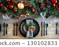 festive table setting in the form of a festive table 130102833