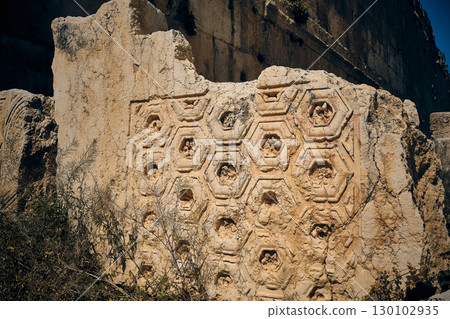 Ancient Stone Wall with Geometric Relief Patterns Ancient Stone Wall with Geometric Relief Patterns 130102935