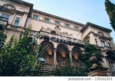 Elegant Facade of Historic European Mansion with Ornate Balcony 130102953