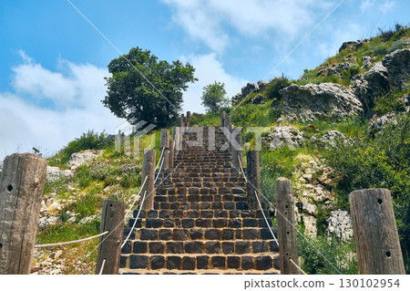 Stone Staircase in Scenic Mountain Landscape 130102954