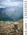 Rock Cairn and Cable Line Overlooking Mountain Valley 130103015