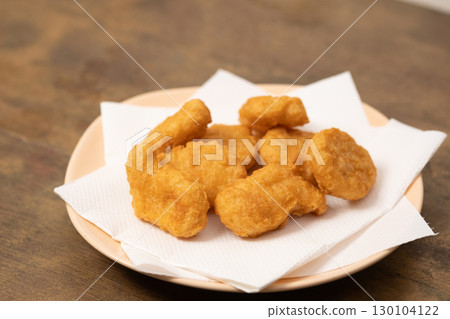 Image of chicken nuggets on a plate (stock photo) 130104122
