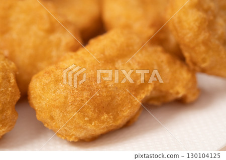 Image of chicken nuggets on a plate (stock photo) 130104125