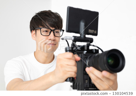 Men shooting movies Men shooting movies 130104539
