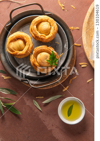 Covilhetes, pastries filled with Maronese veal meat, traditionally baked in black clay molds. Typical pastries of Vila Real, Portugal 130104619