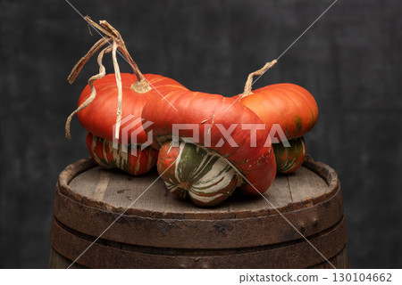 Turban Squash Turks Turban on Rustic Wooden Barrel Turban Squash Turks Turban on Rustic Wooden Barrel 130104662