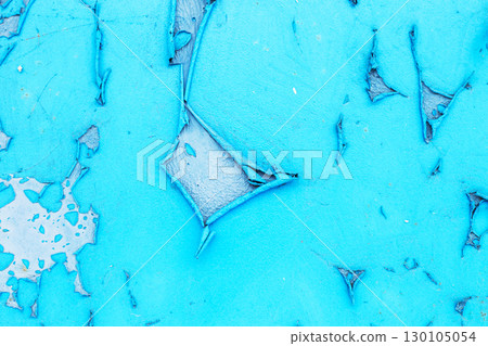 Old blue paint peeling from metal or concrete wall texture background. Old blue paint peeling from metal or concrete wall texture background. 130105054