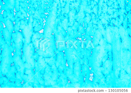 Old blue paint peeling from metal or concrete wall texture background. Old blue paint peeling from metal or concrete wall texture background. 130105056