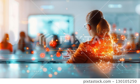 Woman using tablet in a conference hall, glowing with digital network effects. 130105250