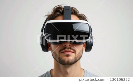 Man Wearing Virtual Reality Headset and Headphones for Gaming or Simulation. 130106232