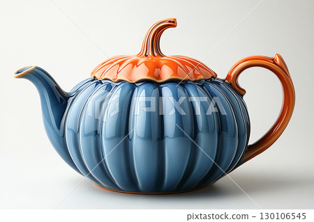 Ceramic teapot in shape of a orange pumpkin in a rustic style on a white background. Ceramic teapot in shape of a orange pumpkin in a rustic style on a white background. 130106545