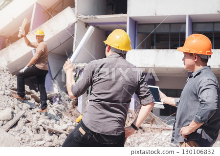 Demolition control supervisor and contractor discussing on demolish building. 130106832