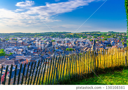 Namur cityscape and wooden fence, aerial view of old town Namur city historical center with colorful buildings houses, skyline panorama of Namur with fields on horizon, Wallonia Region, Belgium Namur cityscape and wooden fence, aerial view of old town Namur city historical center with colorful buildings houses, skyline panorama of Namur with fields on horizon, Wallonia Region, Belgium 130108381