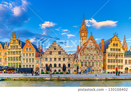 Cityscape of Ghent old town, Graslei Grass Quay with row of historical buildings guild houses on bank of Lys river embankment in Ghent city historic center, East Flanders, Flemish Region, Belgium 130108402