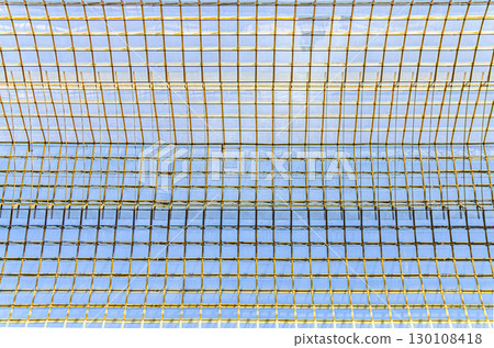 Glass and metal patterned ceiling roof of huge dome of shopping mall skylight, construction transparent window with support system, abstract details, view from below, Brussels city, Belgium Glass and metal patterned ceiling roof of huge dome of shopping mall skylight, construction transparent window with support system, abstract details, view from below, Brussels city, Belgium 130108418
