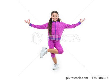 glad teen yoga girl has meditation isolated on white. teen yoga girl has meditation in studio. glad teen yoga girl has meditation isolated on white. teen yoga girl has meditation in studio. 130108624