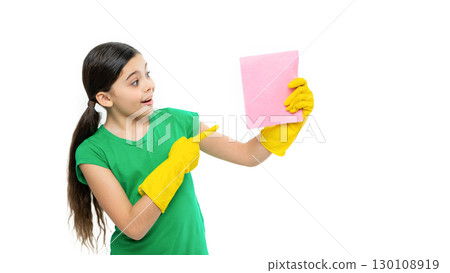 girl cleaner do chores on background, pointing. photo of girl cleaner do chores with duster. girl cleaner do chores on background, pointing. photo of girl cleaner do chores with duster. 130108919