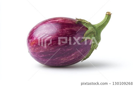 A fresh purple eggplant with a green stem lies on a white background. 130109268