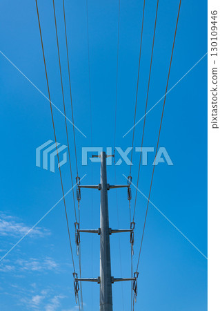 high voltage powerline. powerful substation. electricity provider. powering pylon utility. electricity power lines. pylon producing energy. voltage transmission on electric tower outdoor 130109446