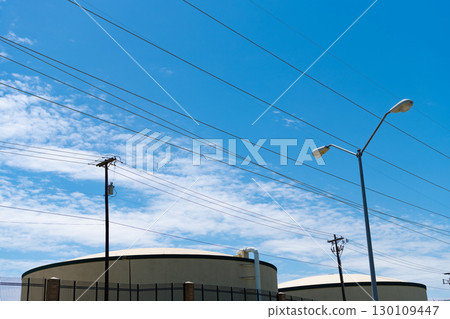 electricity power lines wire. wire producing energy. voltage transmission on electric wire. high voltage powerline. powerful powerline. electricity provider 130109447