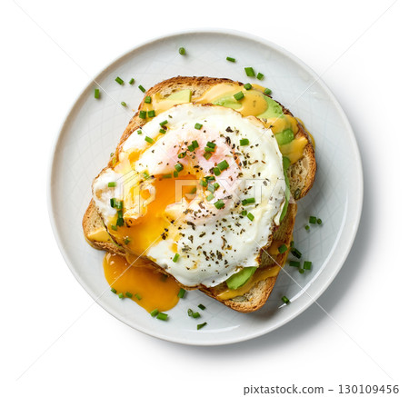 plate of healthy breakfast sandwich with avocado and egg 130109456