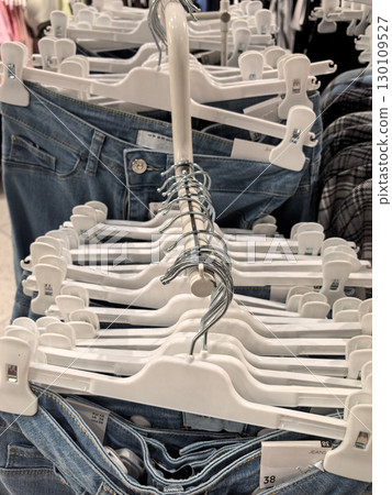 Display of denim styles in a retail store showcasing fashion choices Display of denim styles in a retail store showcasing fashion choices 130109527