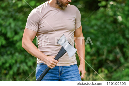 Lumberjack hardworking outdoor. Brutal lumberjack. Brutality and masculinity. Lumberjack man with axe. Lumberjack axe. Man with logging axe. Hardworking brutal man, cropped view 130109803
