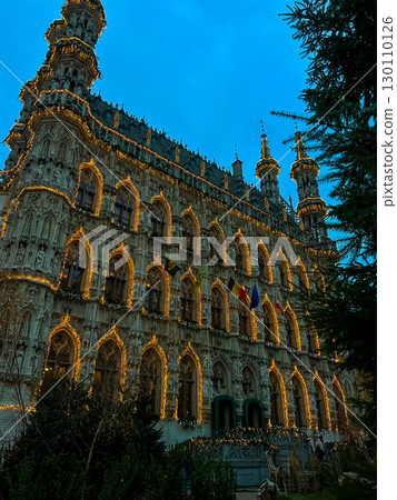 Historical european cityscape in Leuven, Belgium with flags and banners 130110126