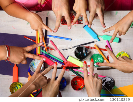 Art and idea concept. Art supplies in hands Art and idea concept. Art supplies in hands 130110259