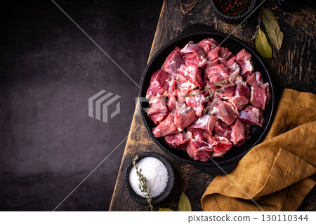 Raw chopped meat with spices Raw chopped meat with spices 130110344