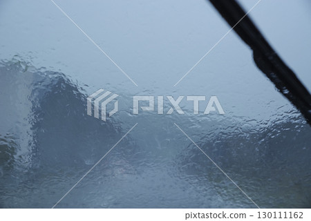 Drivers driving on heavy rainy days 130111162
