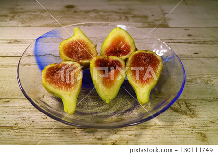 Delicious looking halved figs Delicious looking halved figs 130111749