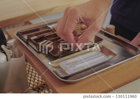 A set of needles and treatment tools used in acupuncture and moxibustion treatment 130111960