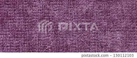 Purple textured velvet fabric background with ribbed corduroy pattern. Soft violet fluffy velour textile macro 130112103