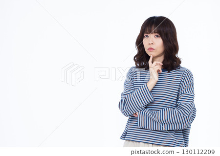 A woman who is seriously worried A woman who is seriously worried 130112209