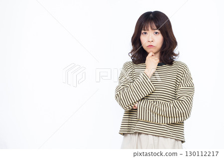 A woman who is seriously worried A woman who is seriously worried 130112217
