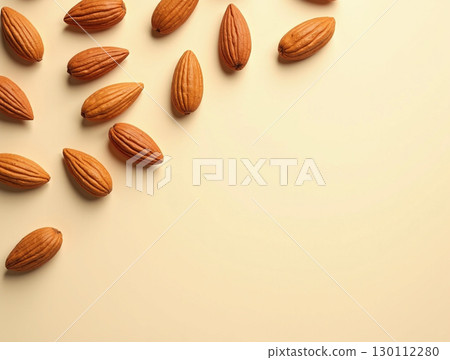 Elegant Studio Almond Still Life Arrangement on Creamy Background 130112280