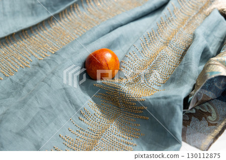 An Elegant and Beautiful Textile Design Featuring Stunning Amber Stone Accents and Intricate Details An Elegant and Beautiful Textile Design Featuring Stunning Amber Stone Accents and Intricate Details 130112875