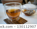 Glass teapot and tea 130112907