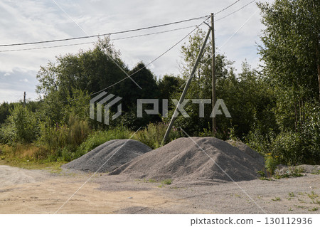 Gravel piles located in a stunning natural setting that beautifully highlight the surroundings Gravel piles located in a stunning natural setting that beautifully highlight the surroundings 130112936