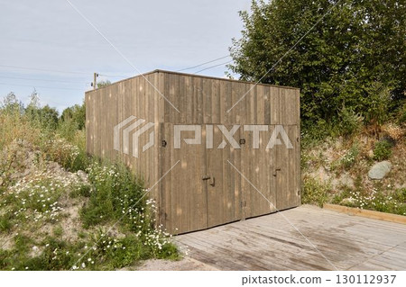 A Beautifully Crafted Rustic Wooden Shed Nestled in a Natural and Picturesque Setting 130112937