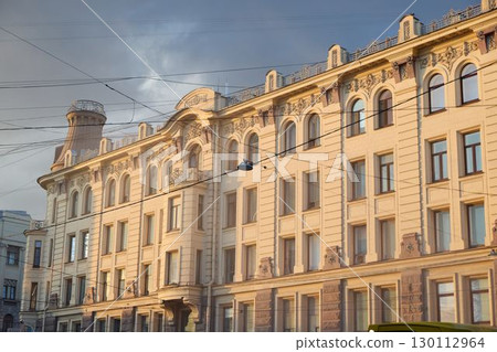 Captivating Historic Building Facade Illuminated in Soft, Warm Evening Light and Shadows Captivating Historic Building Facade Illuminated in Soft, Warm Evening Light and Shadows 130112964